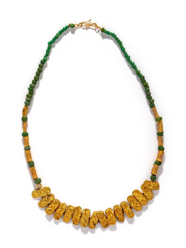 A Roman Gold Garland Necklace: A Roman Gold Garland Necklace with modern green beads Circa 3rd Century A.D. Length 21 1/2 inches (54.61 cm); High karat gold; 17.7 dwt. Property from a New Jersey Private Collection Size<
