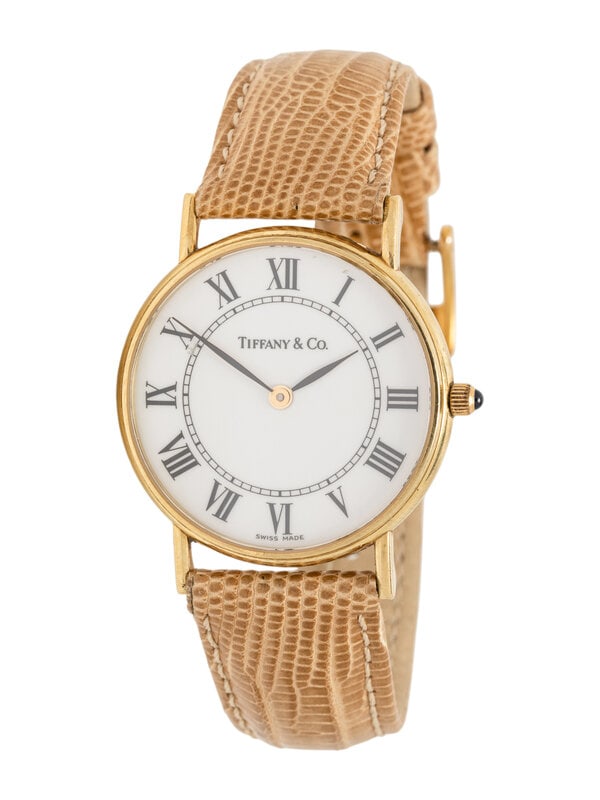 TIFFANY & CO., YELLOW GOLD WATCH: TIFFANY & CO., YELLOW GOLD WATCH Maker: Tiffany & Co. Reference number: 040214731 Case size: Approx. 31 mm Case material: 14K yello