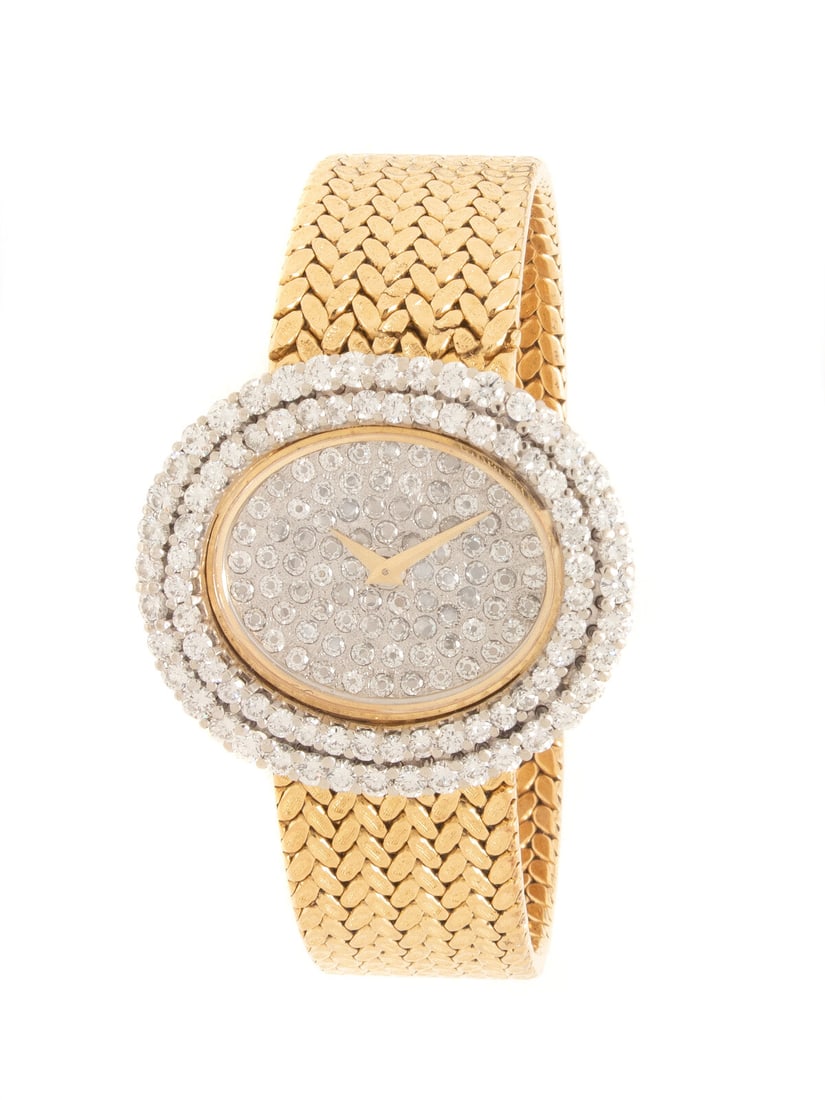 PIAGET, 18K YELLOW GOLD AND DIAMOND WATCH: PIAGET, 18K YELLOW GOLD AND DIAMOND WATCH Maker: Piaget Reference number: 6801 Serial number: 248437 Year: Circa 1990s Case size: Approx. 32 x 28 mm Case material: 18K yellow gold Bezel: Diamond Dial: