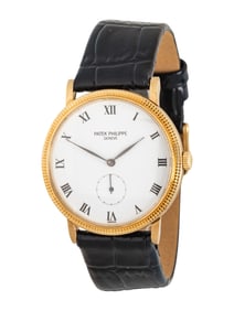 PATEK PHILIPPE, REF. 3919J 18K YELLOW GOLD 'CALATRAVA' WATCH, BOX & PAPERS