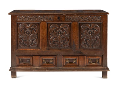 A Jacobean Carved Oak Two-Drawer Mule Chest