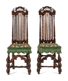 A Pair of William and Mary Style Carved Walnut Side Chairs