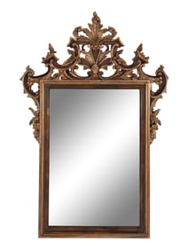 An Italian Baroque Style Carved and Parcel Gilt Mirror