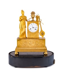 An Empire Gilt Bronze Musical Clock
