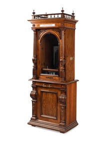 A Polyphon Mikado 24 1/2 Inch Upright Disk Music Box