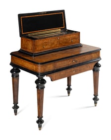 An Interchangeable Music Box on Table by Nicole Frères