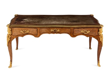 A Louis XV Style Gilt Bronze Mounted Kingwood Bureau Plat