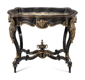 A Napoleon III Gilt Bronze Mounted Ebonized Jardinière Table