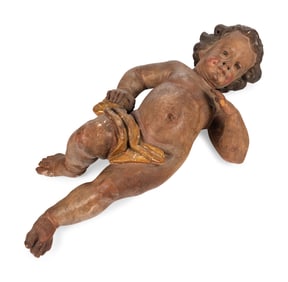 A Painted and Parcel Gilt Wood Figure of a Putto