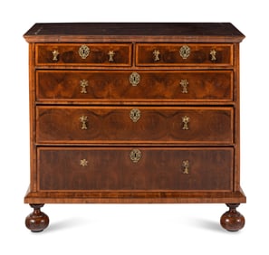 A William and Mary Oyster Walnut Chest of Drawers