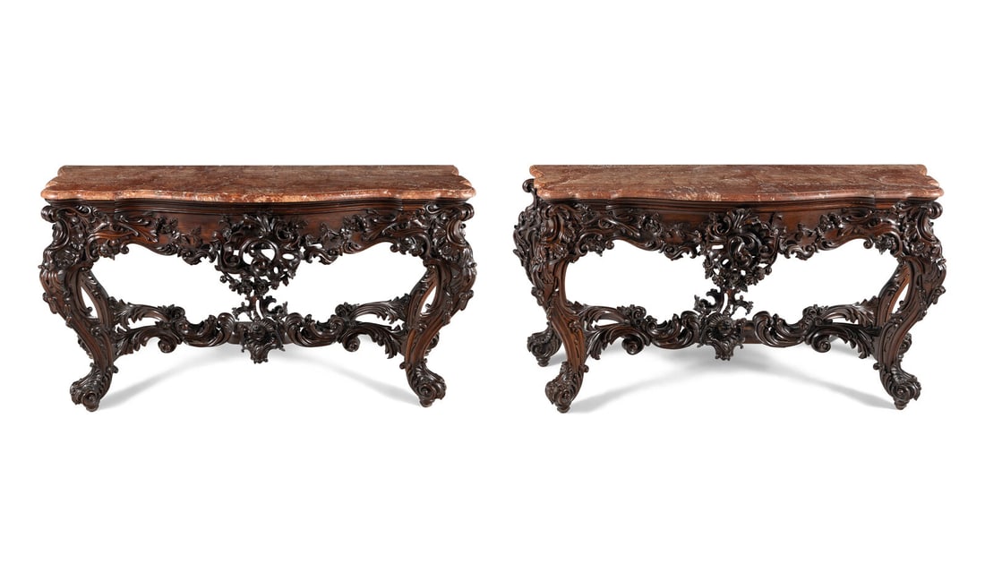 A Pair of English Carved Rosewood Marble-Top Console Tables: A Pair of English Carved Rosewood Marble-Top Console Tables Circa 1840 Height 40 1/2 x width 84 x depth 25 inches. This lot is located in Chicago. Provenance: Sotheby's, London, 16 May 1997, Lot 244