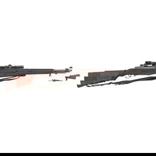 **Springfield Armory M1C Garand Sniper Rifle Rebuilt 1953 with M82 Scope: **Springfield Armory M1C Garand Sniper Rifle Rebuilt 1953 with M82 Scope .30-06. 24" barrel length. SN: 3691197. Parkerized metal arsenal refinish overall set in a walnut semi-pistol grip stock mounti