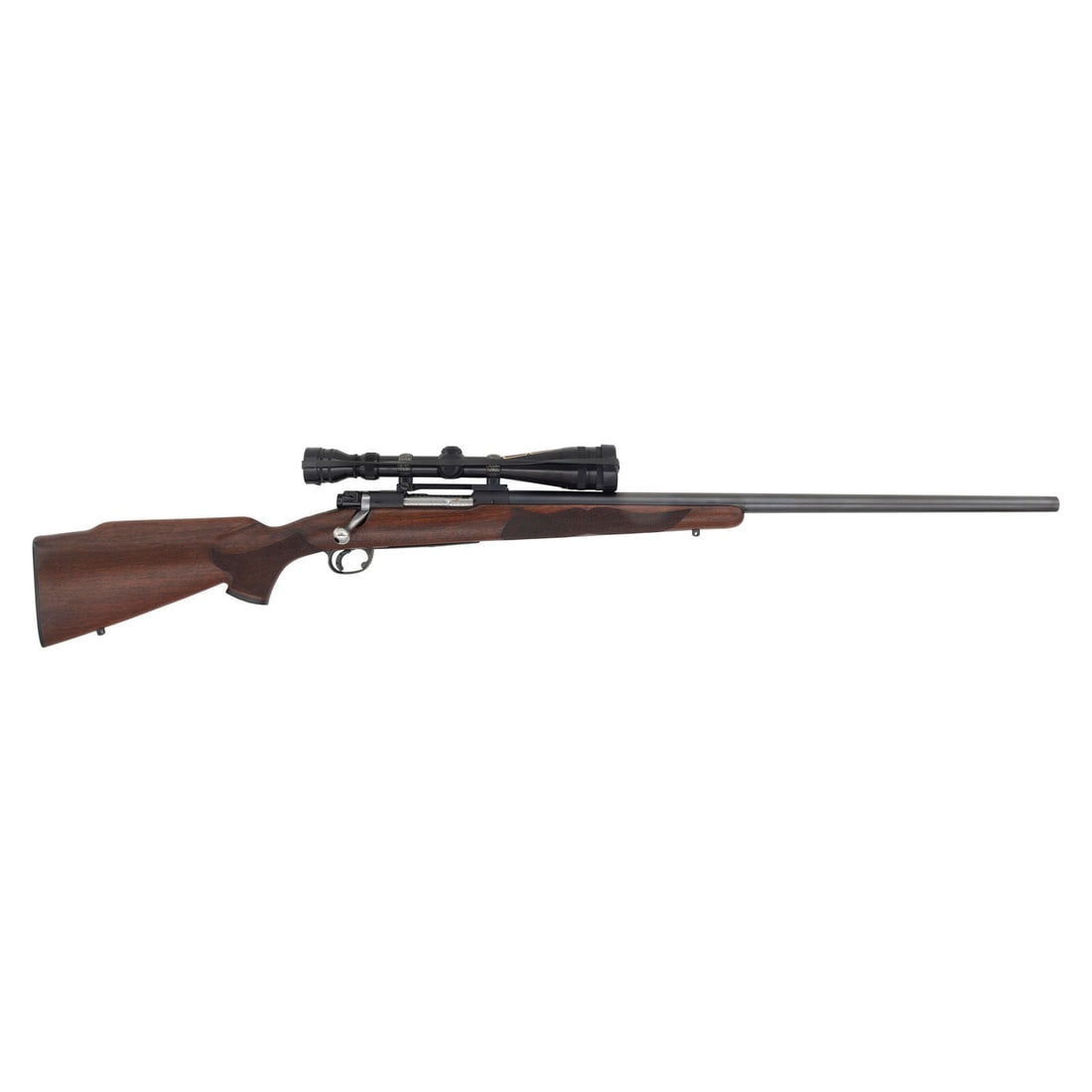 **Winchester Pre-64 Model 70 Custom with Redfield Scope in .243: **Winchester Pre-64 Model 70 Custom with Redfield Scope in .243 .243 Winchester. 26" barrel length. SN: 457672. Matte blued finish to the barrel and receiver with jeweled bolt and extractor, polished 