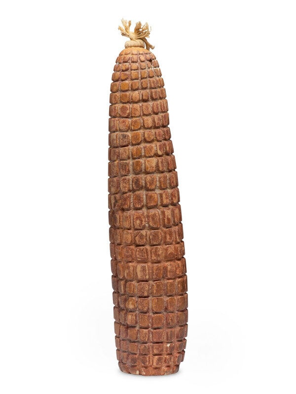 Pueblo Corn Fetish: Pueblo Corn Fetish 20th century carved stone ear of corn, topped with cotton knot height 17 inches x diameter 3 inches This lot is located in Cincinnati.
