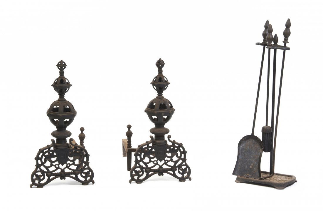 A Pair of Neoclassical Wrought Iron Andirons, Height: A Pair of Neoclassical Wrought Iron Andirons, each with three graduated spherical finials over the foliate cast base, together with a set of associated fireplace tools comprising a poker, a brush and