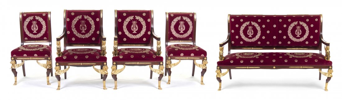 An Empire Gilt Metal Mounted Parlor Suite, Height : An Empire Gilt Metal Mounted Parlor Suite, comprised of two side chairs, two armchairs and one settee, having gilt metal mounts throughout with square upholstered backs with armrests supported by sphi