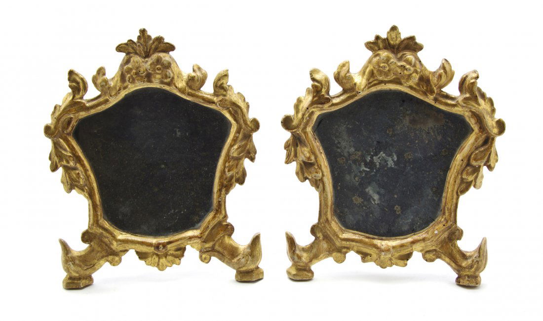 A Pair of Italian Baroque Style Giltwood Table Mir: A Pair of Italian Baroque Style Giltwood Table Mirrors, each of cartouche form with a foliate frame. Height 9 7/8 inches.