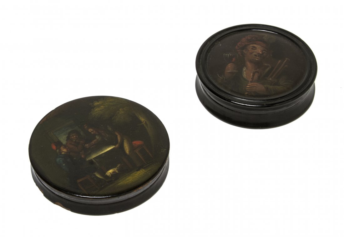 Two Continental Lacquered Papier Mache Snuff Boxes: Two Continental Lacquered Papier Mache Snuff Boxes, each of circular form, one decorated with a bagpipe player holding a glass of wine, the other decorated with three gentleman playing cards. Diameter