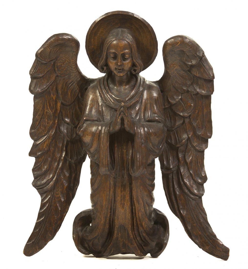 A Continental Carved Oak Figure, Height 25 inches.: A Continental Carved Oak Figure, depicting a kneeling angel with hands clasped in prayer. Height 25 inches. Property from the Estate of Mr. Mark Fritz, West Bloomfield, Michigan