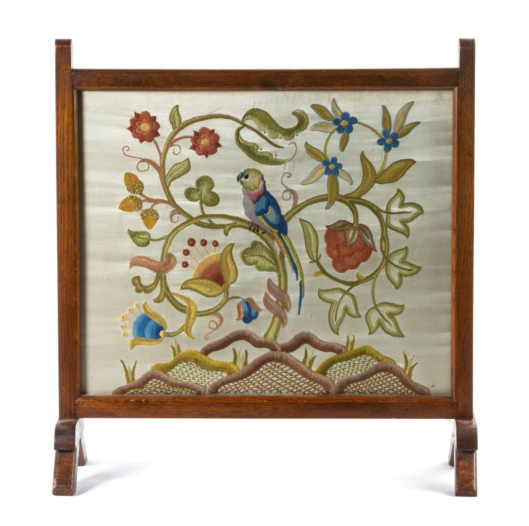 An English Needlework Inset Firescreen, Height ove: An English Needlework Inset Firescreen, of rectangular form depicting a parrot on flowering branches. Height overall 25 inches. Property from the Estate of Mr. Mark Fritz, West Bloomfield, Michigan