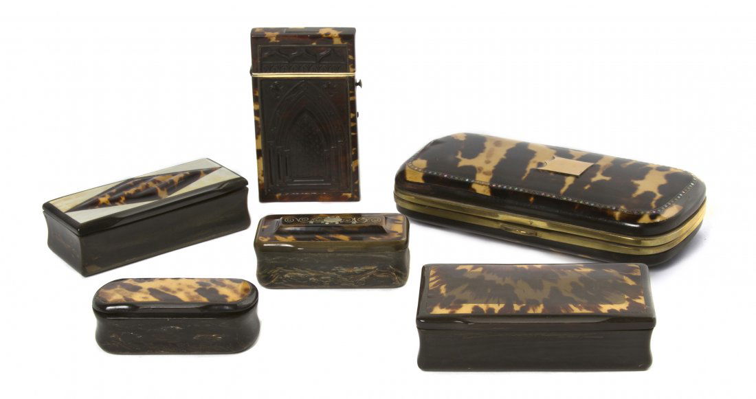 A Collection of Tortoise Shell and Tortoise Shell: A Collection of Tortoise Shell and Tortoise Shell Mounted Boxes, comprising a cigar case, three tobacco boxes and a card case. Length of longest 5 3/4 inches. Property from the Estate of Mr. Mark Frit