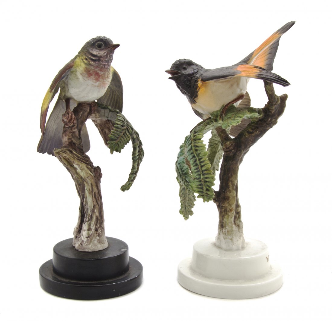 A Pair of Royal Worcester Dorothy Doughty Birds, A: A Pair of Royal Worcester Dorothy Doughty Birds, American Redstarts, each depicted perched on a hemlock branch. Height of taller 9 1/4 inches. Property from the Children's Museum of Indianapolis, Indi