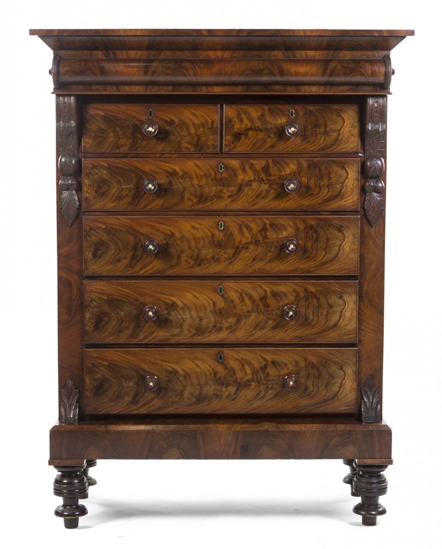 An American Classical Mahogany High Boy, Height 72: An American Classical Mahogany High Boy, having an overhanging cornice above two short drawers over four graduated long drawers, raised on turned feet. Height 72 x width 54 x depth 25 1/4 inches. Prop