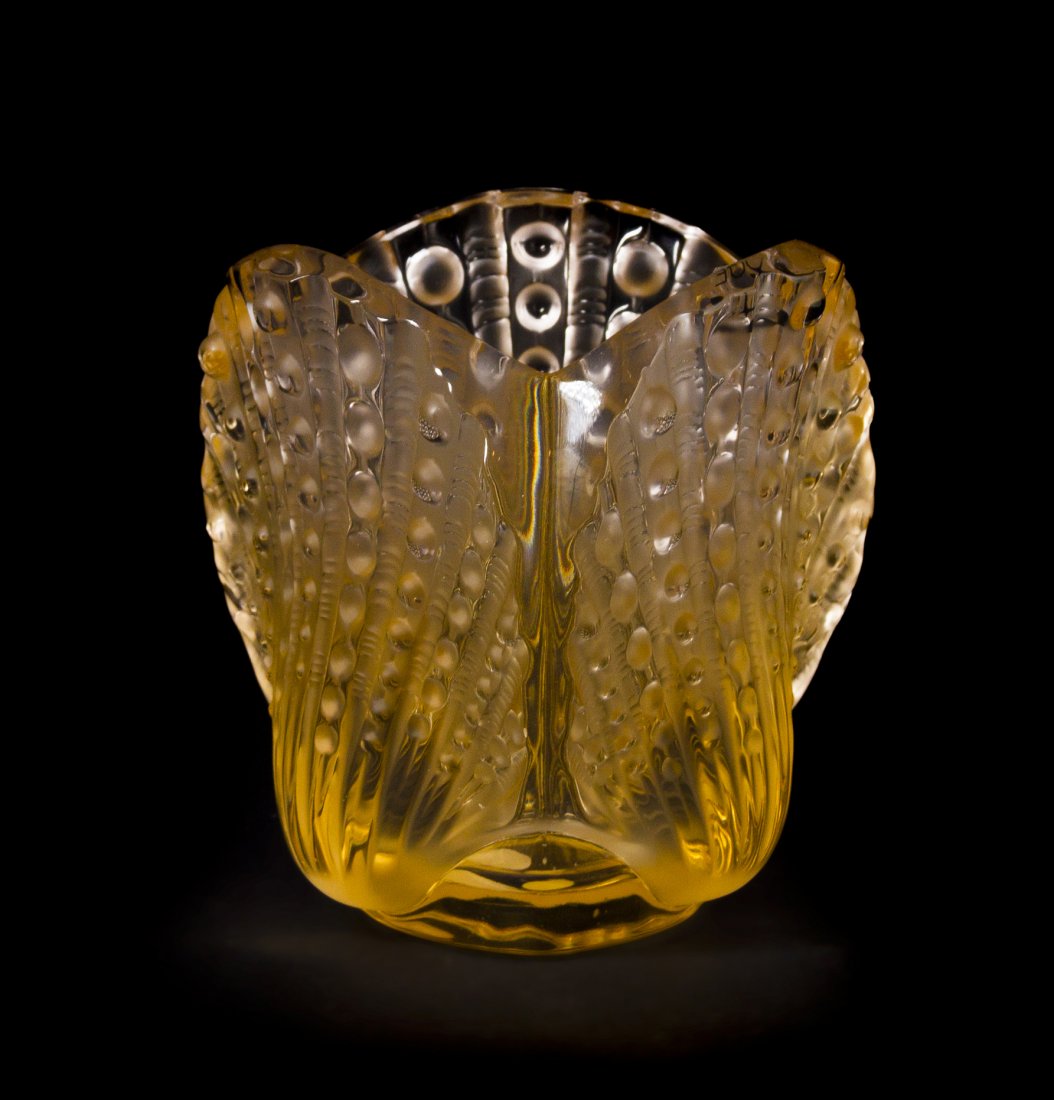 A Lalique Molded and Frosted Amber Glass Vase, Hei: A Lalique Molded and Frosted Amber Glass Vase, St. Jacques, modeled with three shells, signed Lalique R France. Height 4 5/8 inches.