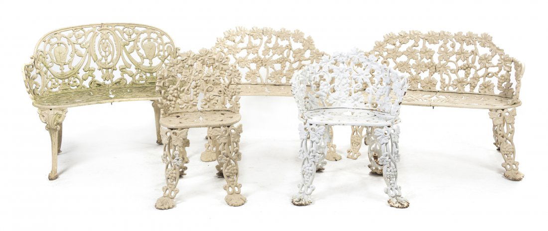 A Suite of Victorian Cast Iron Garden Furniture, W: A Suite of Victorian Cast Iron Garden Furniture, in a grapevine pattern comprising four settees, four side chairs and a side table. Width of first 32 inches. Property from the Dr. Myrna Salud Living T