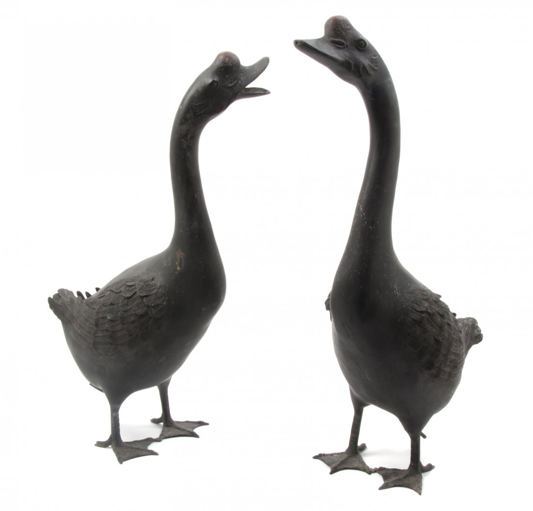A Pair of Japanese Painted Lead Geese, Height of t: A Pair of Japanese Painted Lead Geese, each in a standing pose, one with an open beak. Height of taller 24 3/8 inches.
