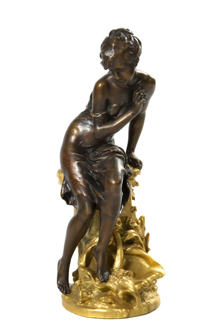 A French Bronze and Parcel Gilt Figure, Mathurin M: A French Bronze and Parcel Gilt Figure, Mathurin Moreau (1822-1912), depicting the nymph Odine seated atop a fountain having a dolphin mask spout and shell form bowl with further foliate decoration on
