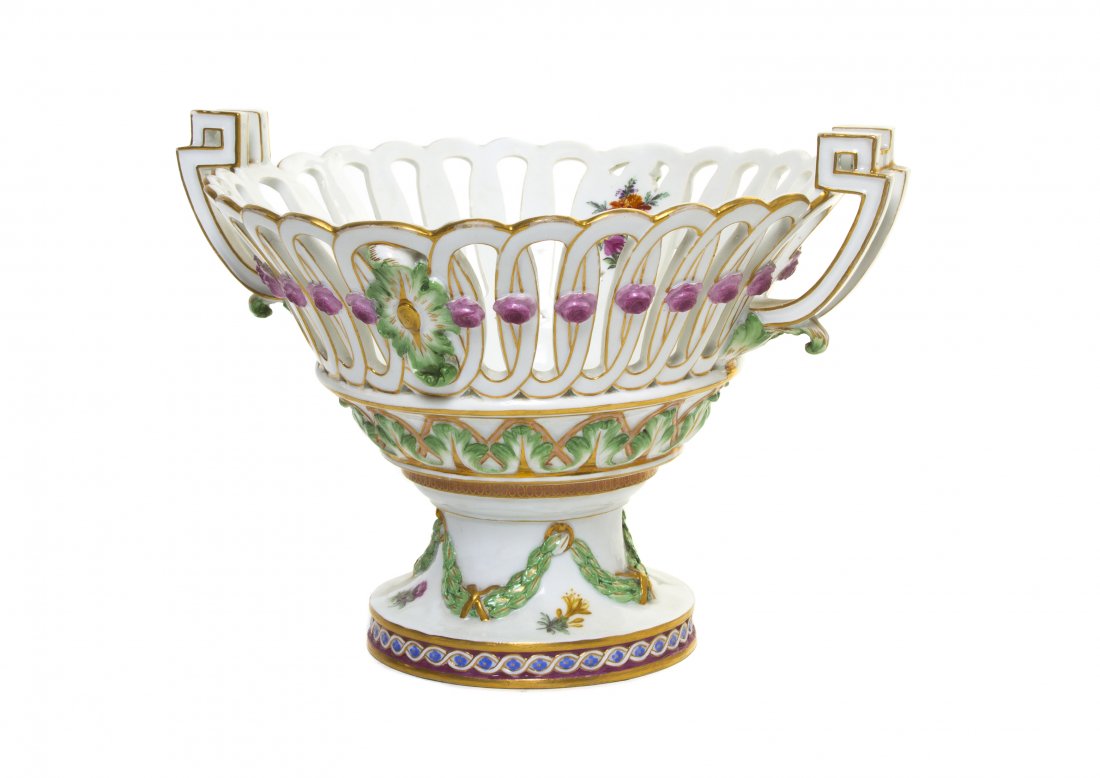 A Meissen Marcolini Period Porcelain Center Bowl,: A Meissen Marcolini Period Porcelain Center Bowl, of circular handled form with a reticulated border, raised on a festoon decorated pedestal base, having starred crossed swords mark in underglaze blue
