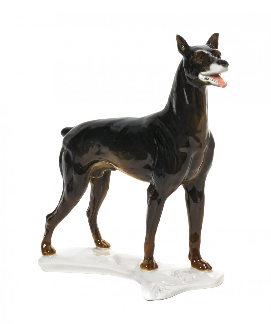 A Volkstedt Porcelain Figure, Karl Ens, Width 8 1/: A Volkstedt Porcelain Figure, Karl Ens, depicting a standing dog with ENS Germany mark, further impressed 87378. Width 8 1/2 inches. Property from the Collection of Do Dillon, Chicago, Illinois