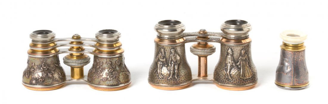 Two Pairs of French Silver and Silvered Opera Gla: Two Pairs of French Silver and Silvered Opera Glasses, the first by Jumelle Flammarion, a triple-telescoping example, the second unmarked with hammered decoration and figural scenes, together with an