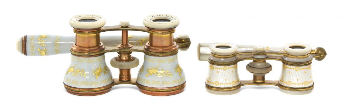 Two Pairs of French Guilloche Enameled Opera Glas: Two Pairs of French Guilloche Enameled Opera Glasses, the first Cam LaFontaine, Paris, having musical trophy and vine decoration, the second unmarked with foliate decoration, each with handle. Width o