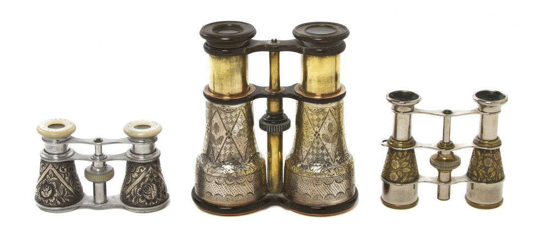 Two Pairs of Silvered Metal Cased Opera Glasses,: Two Pairs of Silvered Metal Cased Opera Glasses, the first Verdi, Paris, together with a brass cased example; three items total. Width of widest 4 3/4 inches. Property from the Estate of Mr. Mark Frit