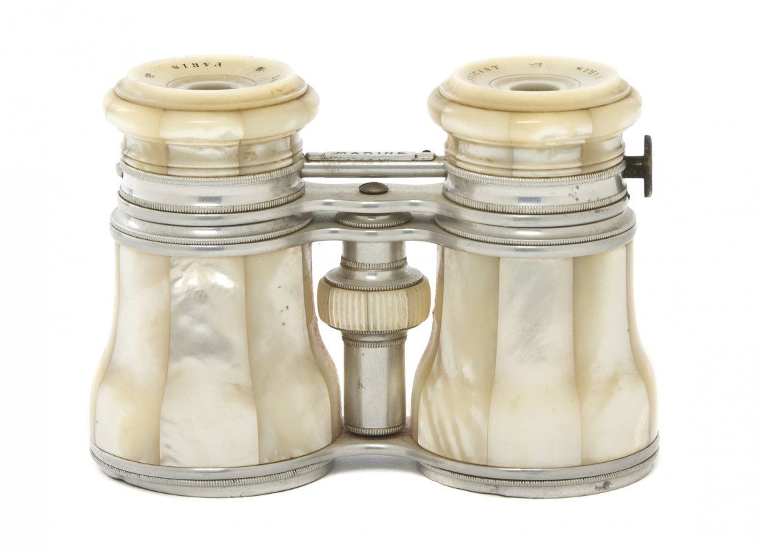 A Pair of French Mother-of-Pearl Veneered Opera G: A Pair of French Mother-of-Pearl Veneered Opera Glasses, Lemaire, Paris, having an aluminum frame with Marine/Field/Theatre adjustment. Width 4 1/2 inches. Property from the Estate of Mr. Mark Fritz,