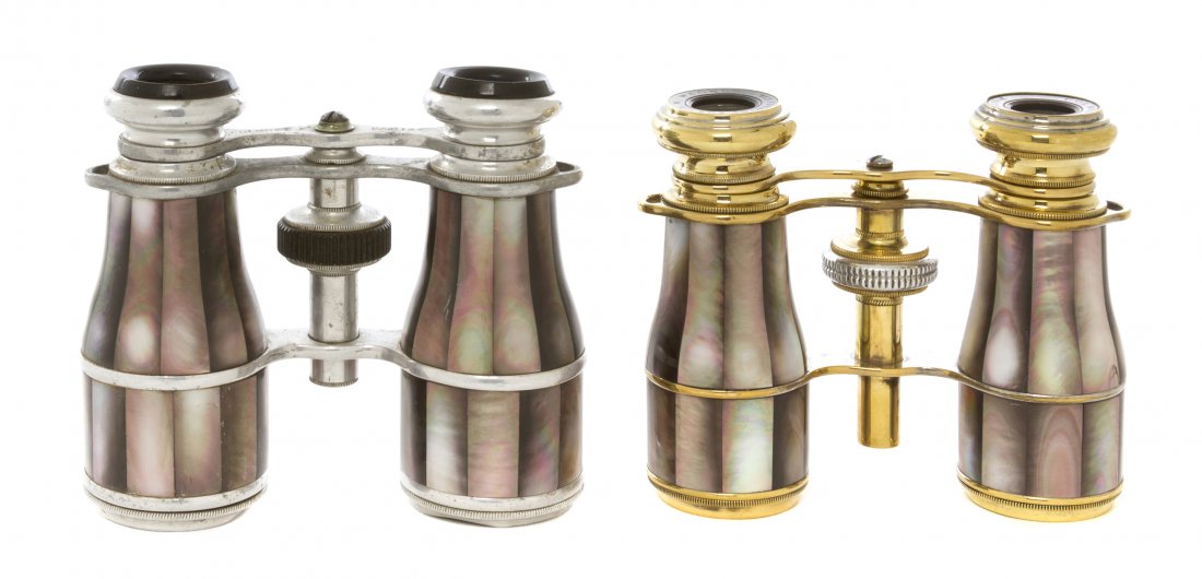 Two Pairs of French Mother-of-Pearl Veneered Oper: Two Pairs of French Mother-of-Pearl Veneered Opera Glasses, Colmont, Paris, one with gilt metal hardware, the other silvered. Width of wider 4 inches. Property from the Estate of Mr. Mark Fritz, West 