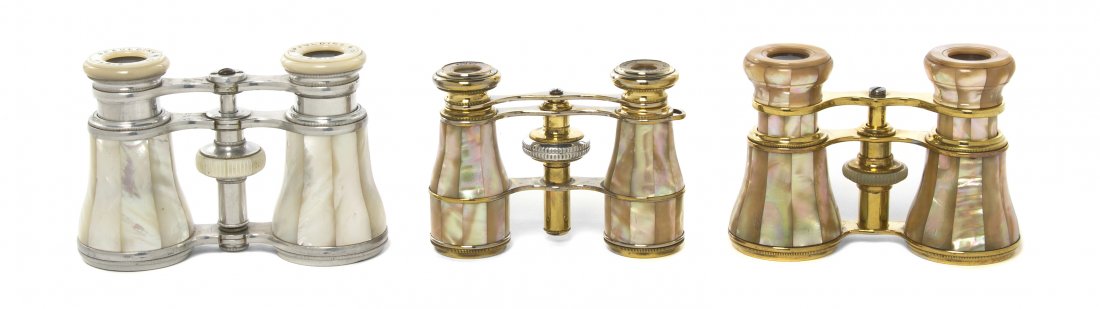 Three Pairs of French Mother-of-Pearl Veneered Op: Three Pairs of French Mother-of-Pearl Veneered Opera Glasses, the first La Reine, Paris, the second Spalding & Co., Paris, the third unmarked. Width of widest 4 3/8 inches. Property from the Estate of