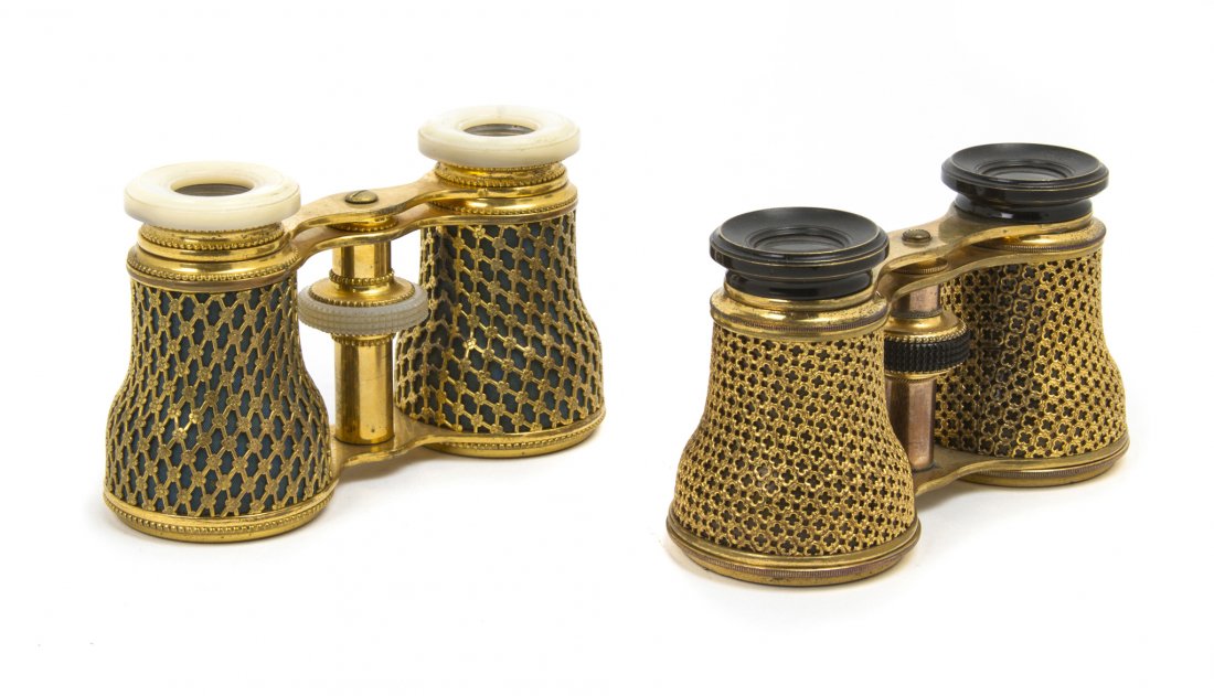 Two Pairs of French Opera Glasses, Width of wider: Two Pairs of French Opera Glasses, each with gilt metal mesh decoration. Width of wider 4 1/4 inches. Property from the Estate of Mr. Mark Fritz, West Bloomfield, Michigan