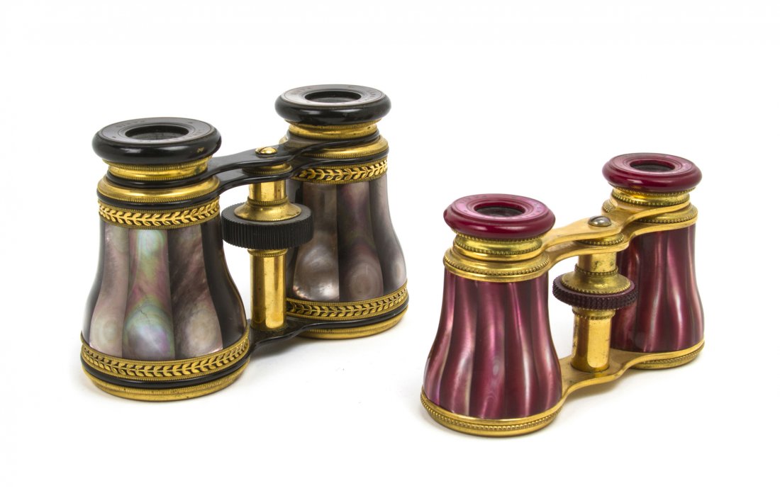 Two Pairs of French Mother-of-Pearl Veneered Oper: Two Pairs of French Mother-of-Pearl Veneered Opera Glasses, Lemaire, one grey, the other magenta. Width of wider 4 3/8 inches. Property from the Estate of Mr. Mark Fritz, West Bloomfield, Michigan