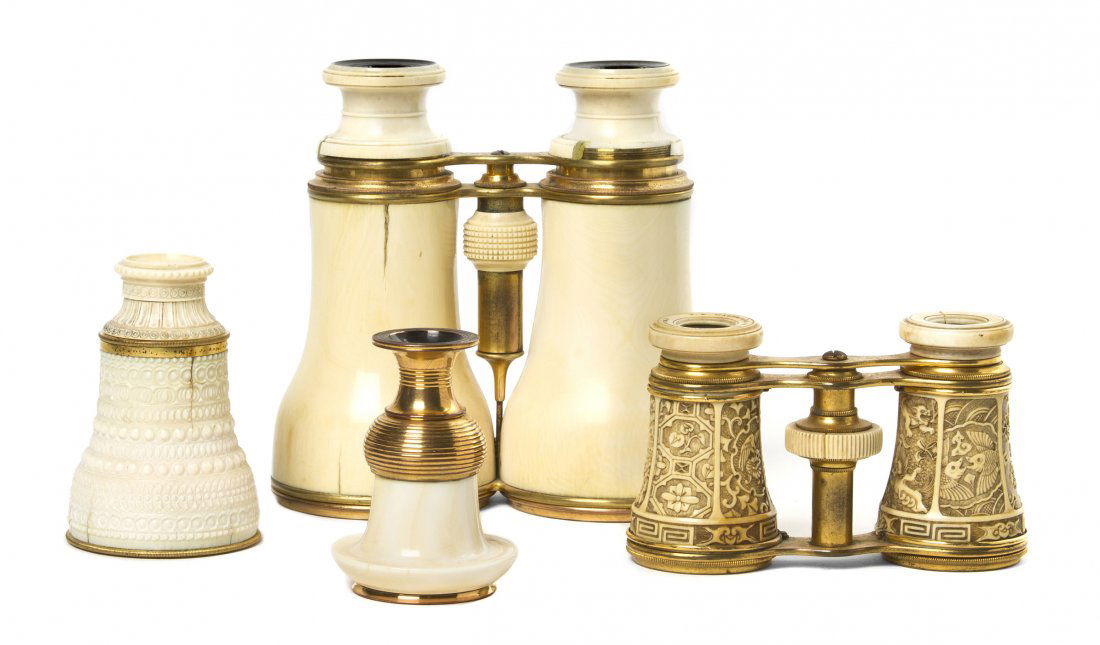 A Pair of English Ivory Veneered Opera Glasses, W: A Pair of English Ivory Veneered Opera Glasses, together with a pair of ivory veneered opera glasses and two monoculars. Width of first 4 7/8 inches. Property from the Estate of Mr. Mark Fritz, West B