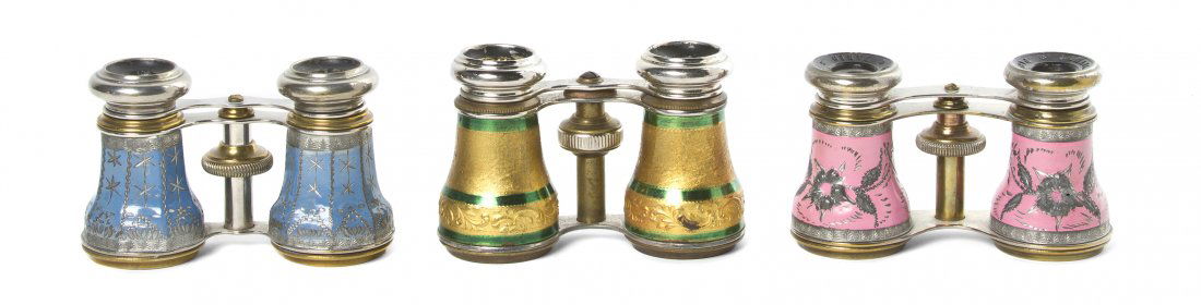 Three Pairs of French Opera Glasses, Width 4 1/8: Three Pairs of French Opera Glasses, comprising an example by Lamain with foliate decoration in relief and two unmarked examples, each having a steel frame. Width 4 1/8 inches. Property from the Estat