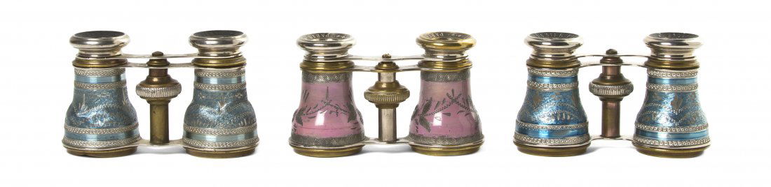 Three Pairs of French Opera Glasses, Lamier, Widt: Three Pairs of French Opera Glasses, Lamier, each cylinder with bright cut stylized foliate decoration, having brass and steel frames. Width 4 1/8 inches. Property from the Estate of Mr. Mark Fritz, W