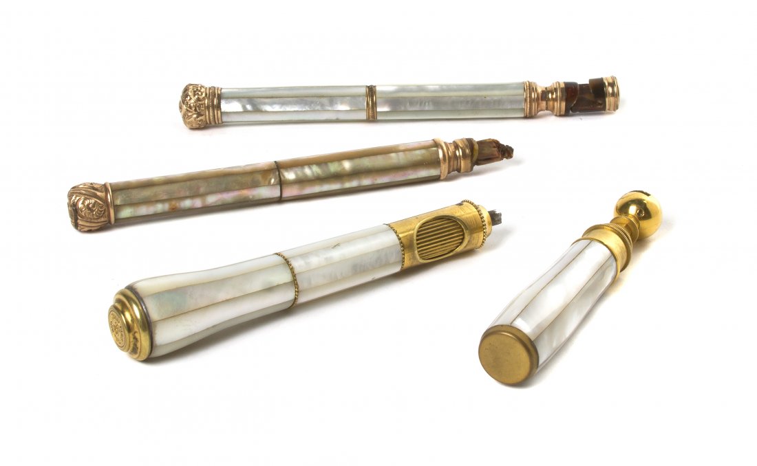 Four French Mother-of-Pearl Veneered Opera Glass: Four French Mother-of-Pearl Veneered Opera Glass Handles, comprising one center mount example with a focal wheel and three others, one having a fitted leather case. Length of longest 6 1/8 inches. Pro