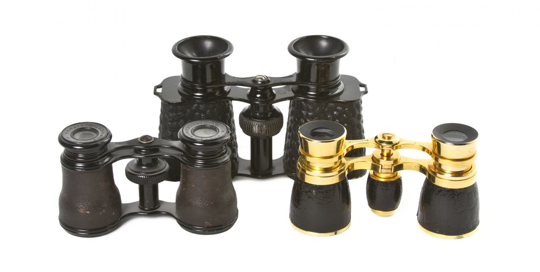 Two Pairs of French Leather Veneered Opera Glasse: Two Pairs of French Leather Veneered Opera Glasses, one by Lemaire, the other by Brigitte, together with an English example. Width of widest overall 4 3/4 inches. Property from the Estate of Mr. Mark 