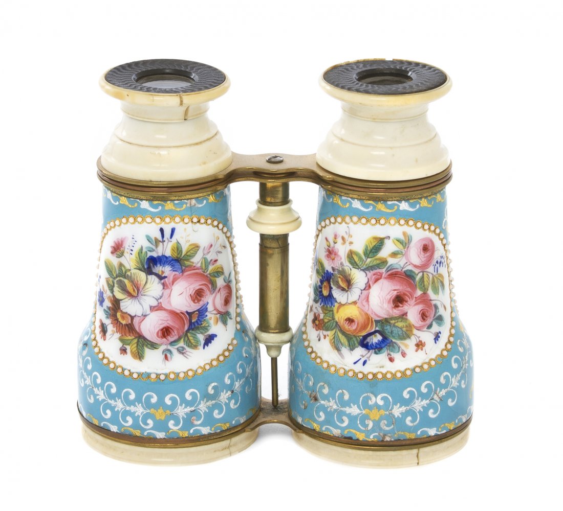 A Pair of French Enameled and Ivory Inset Binocul: A Pair of French Enameled and Ivory Inset Binoculars, having polychrome floral decoration on a blue field. Width 4 3/4 inches. Property from the Estate of Mr. Mark Fritz, West Bloomfield, Michigan