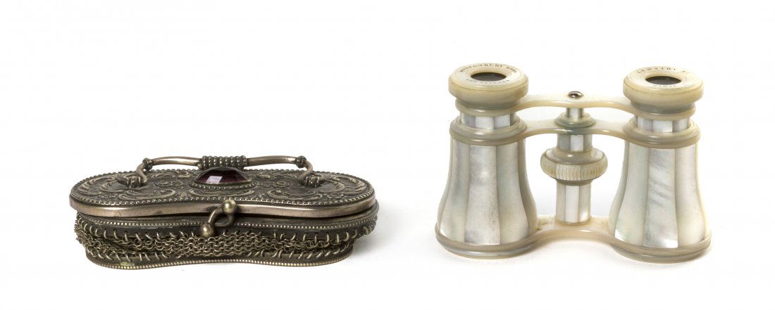 A Pair of French Mother-of-Pearl Veneered Opera G: A Pair of French Mother-of-Pearl Veneered Opera Glasses, Lemaire, Paris, retailed by Montgomery Brothers, Los Angeles, set in a mesh fitted case. Width 3 7/8 inches. Property from the Estate of Mr. Ma