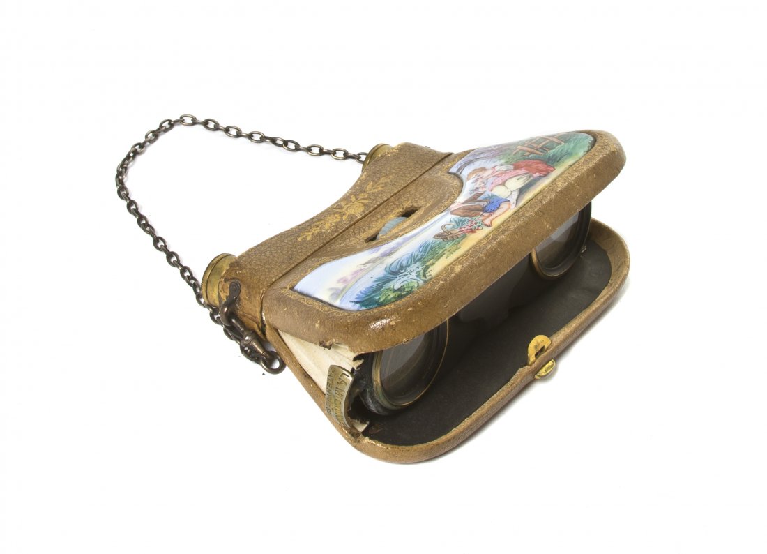 A Pair of French Enameled and Tooled Leather Oper: A Pair of French Enameled and Tooled Leather Opera Glasses, A. Gualdoni, Paris, decorated with a courting couple by the shore. Width 4 1/4 inches. Property from the Estate of Mr. Mark Fritz, West Bloo