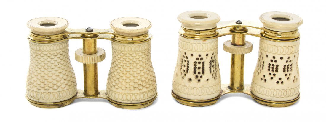 Two Pairs of Carved Ivory Veneered Opera Glasses,: Two Pairs of Carved Ivory Veneered Opera Glasses, each with repeating geometric decoration and gilt metal frames. Width 4 1/4 inches. Property from the Estate of Mr. Mark Fritz, West Bloomfield, Michi